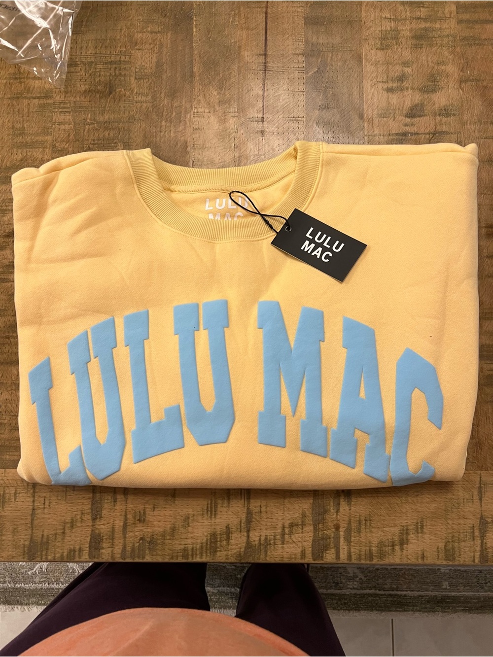 Women's Crewneck Sweatshirt in Pale Yellow with Sky Blue Logo